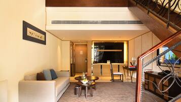 Duplex | Living area | Flat-screen TV