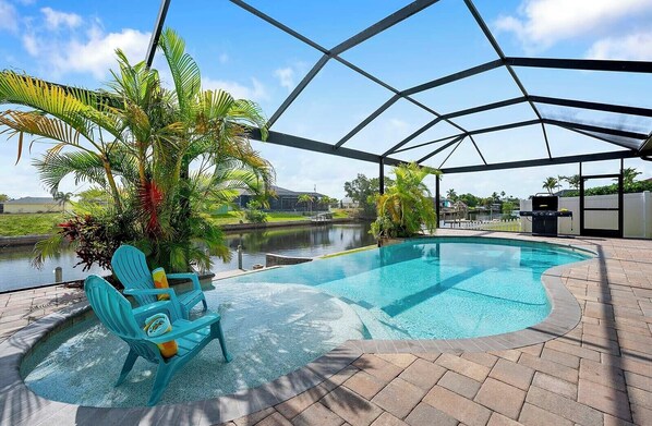 A heated pool, sun loungers - Silhouette - Upscale Home with Relaxing Outdoor Living (Cape Coral)
