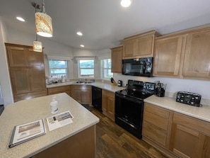 Fridge, dishwasher, coffee/tea maker, toaster