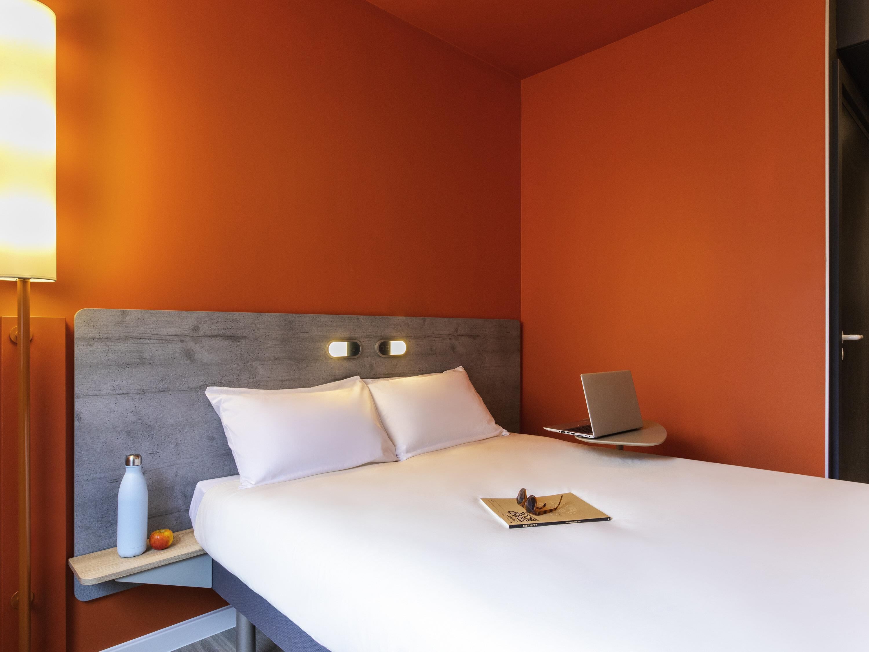 Premium bedding, pillow-top beds, desk, blackout curtains