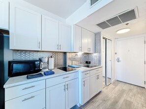 Fridge, microwave, coffee/tea maker, toaster