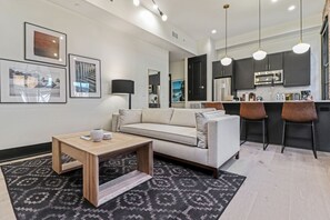 1 Bedroom | Living area | 42-inch Smart TV with digital channels, TV, Netflix