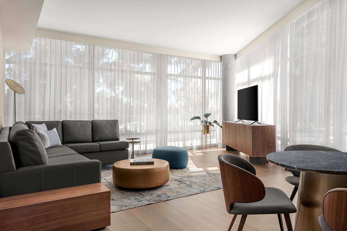 Suite, 1 King Bed with Sofa bed, Non Smoking | Living area | Flat-screen TV