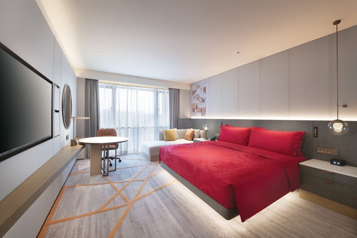 Premium bedding, down duvets, pillow-top beds, free minibar items