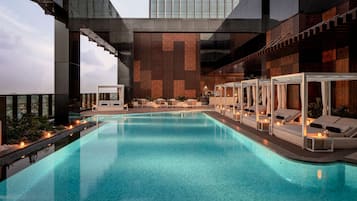 2 outdoor pools, open 8:00 AM to 8:00 PM, free pool cabanas