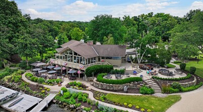 The Oaks Retreat |Abbey Springs Resort |Upper & Lower Living Rooms |Wraparound Deck |Pool |Beach
