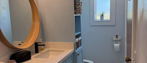 Hair dryer, towels, soap, shampoo