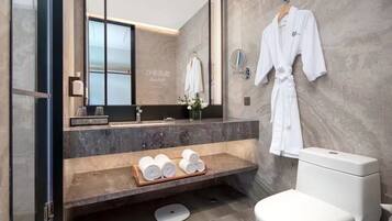 Shower, hydromassage showerhead, designer toiletries, hair dryer
