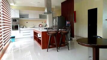 Villa | Private kitchen | Fridge, microwave, oven, coffee/tea maker