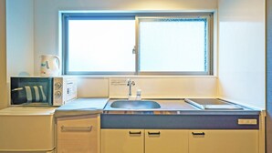 1Bedroom Apartment | Private kitchenette | Fridge, microwave, stovetop, electric kettle - Gracia Hotel (Osaka)