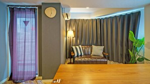 1Bedroom Apartment | Living room | Flat-screen TV - Gracia Hotel (Osaka)