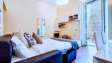 1 Schlafzimmer, BĂŒgeleisen/BĂŒgelbrett, kostenloses WLAN, BettwĂ€sche