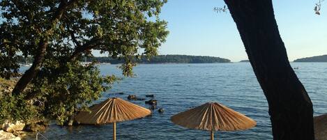 Beach nearby, sun loungers