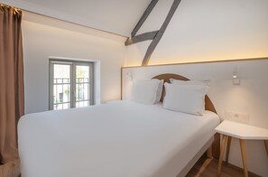 Ropa de cama de alta calidad y colchones con acolchado adicional