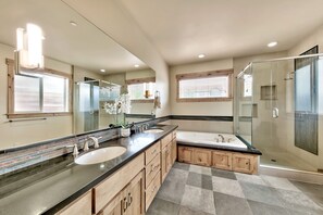Shower, jetted tub, towels