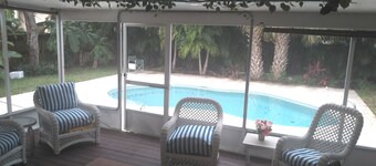 Comfortable 3 bedroom 3 bath beach house .pool..3 minute walk to beach.