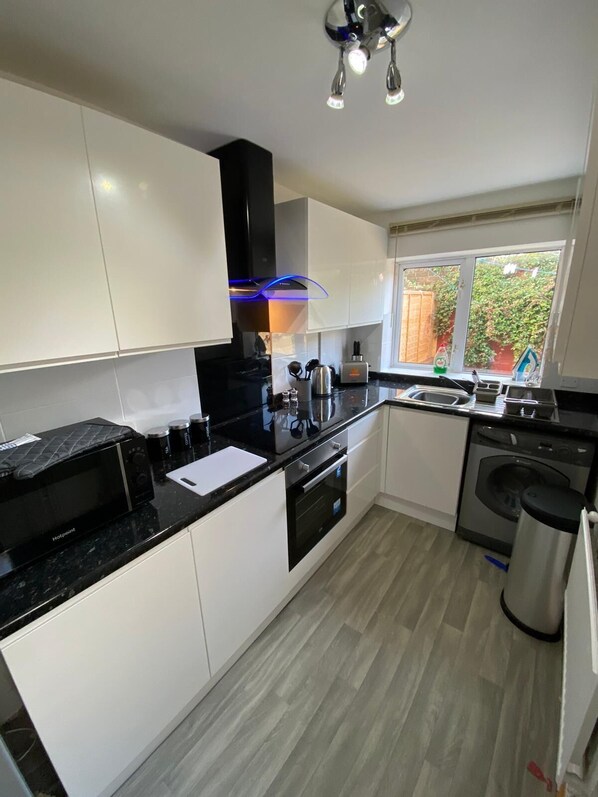 Apartment | Private kitchen | Fridge, microwave, cookware/dishes/utensils