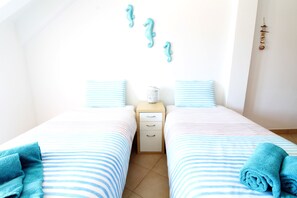 2 habitaciones, tabla de planchar con plancha, internet y ropa de cama 
