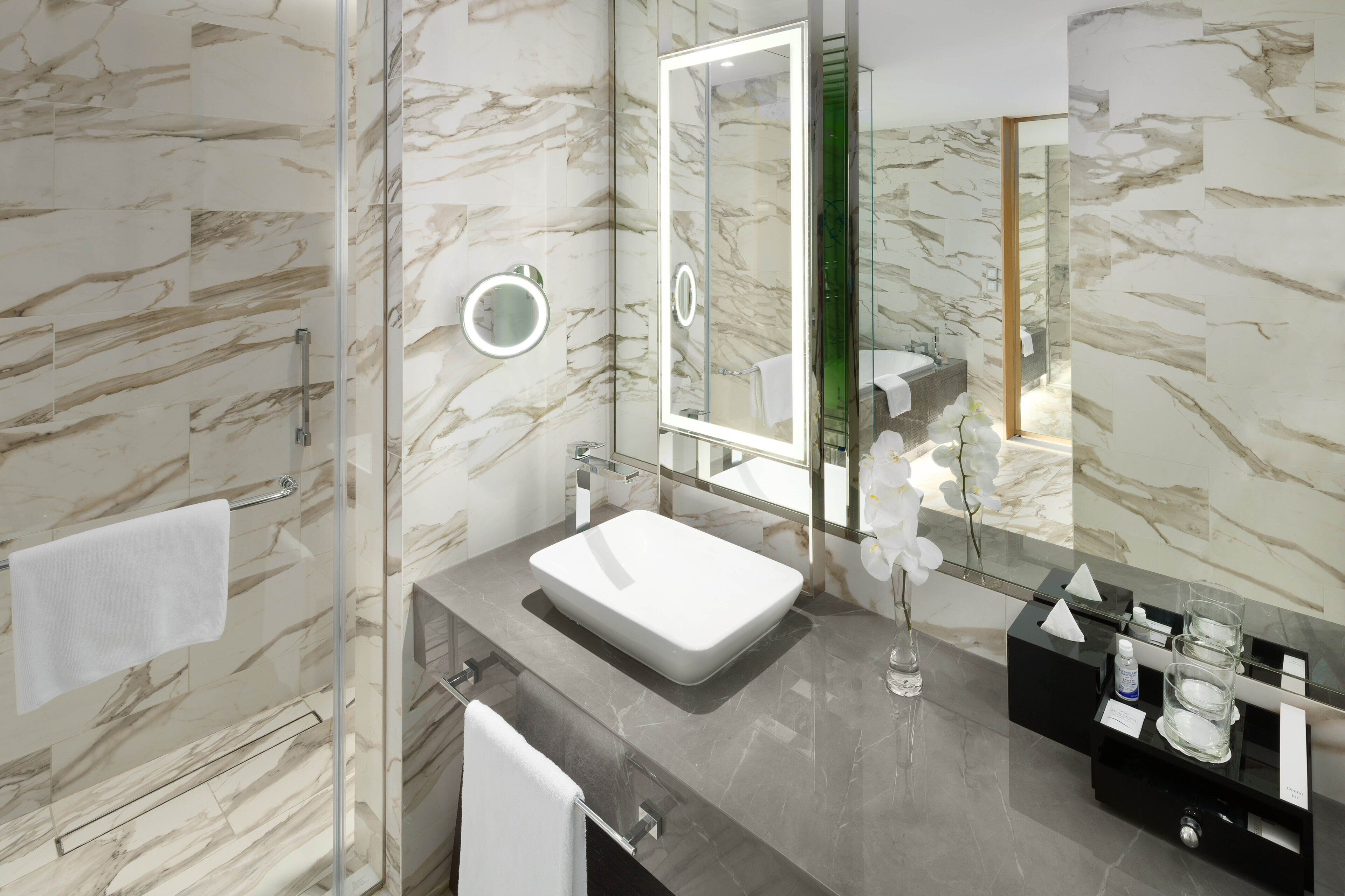 hair dryer, bathrobes, slippers, towels