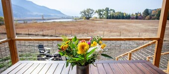 Evergreen Lane Getaway · River Views and Front Porch Sitting in Paradise