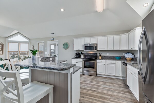 Fridge, microwave, oven, stovetop - 1521 - A Summer Place, 6-bed 5.5-bath, Corolla, NC, pet friendly, private pool, hot tub, game room (Corolla)