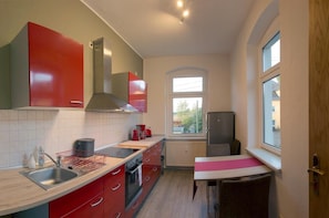 Fridge, stovetop, coffee/tea maker, toaster