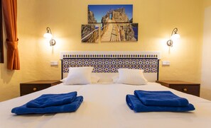 2 habitaciones, tabla de planchar con plancha y cuna de viaje