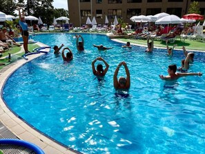 A swimming pool with people exercising. - Holiday Park (Varna)