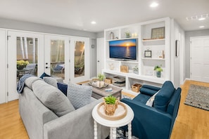 Smart TV, fireplace, books