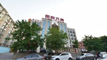 A multi-story building with signage indicating a business or educational establishment.