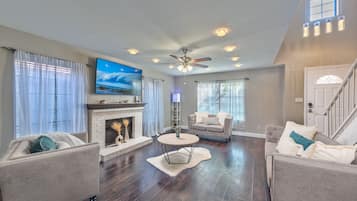 Smart TV, chimenea, videojuegos, futbolito