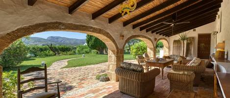 Plant, Property, Furniture, Table, Wood, Shade, Building, Interior Design, Outdoor Furniture, Cottage