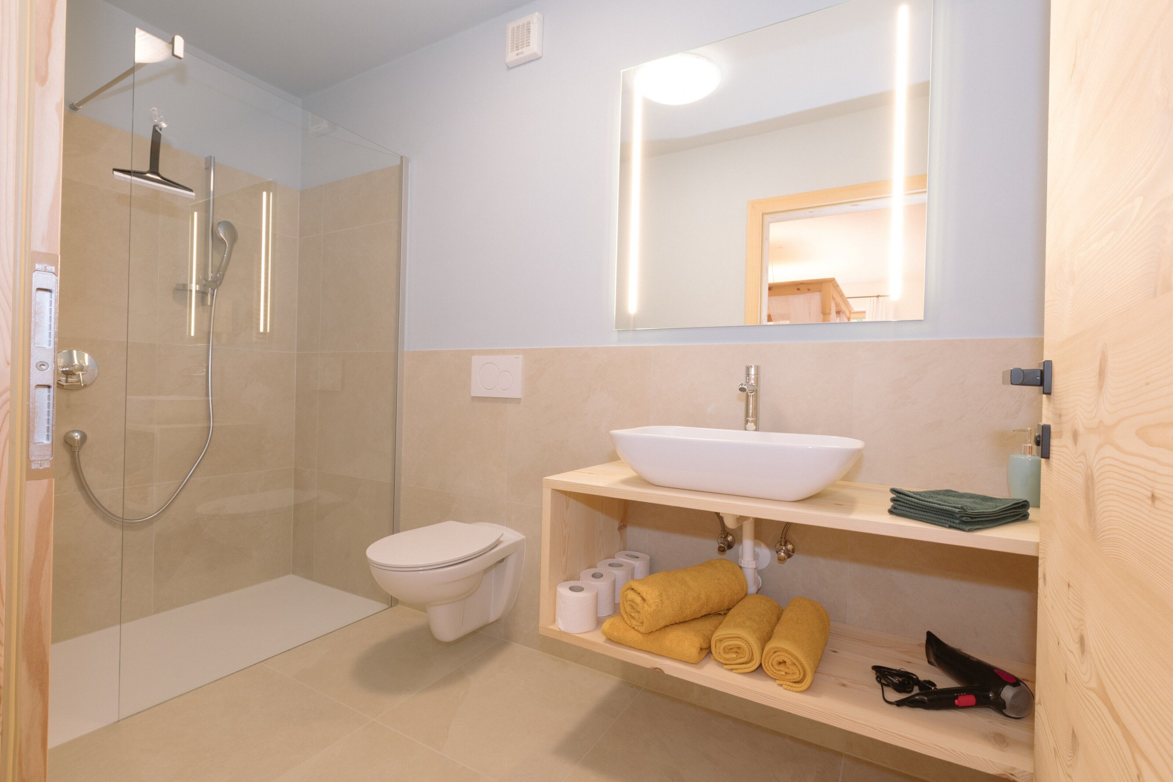 Shower, free toiletries, hair dryer, towels