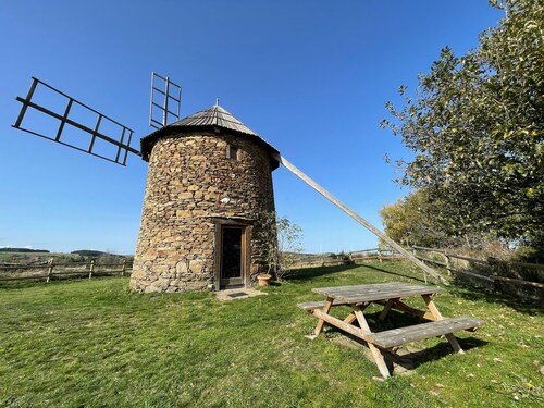 Small mill with garden, near windmills and turbines