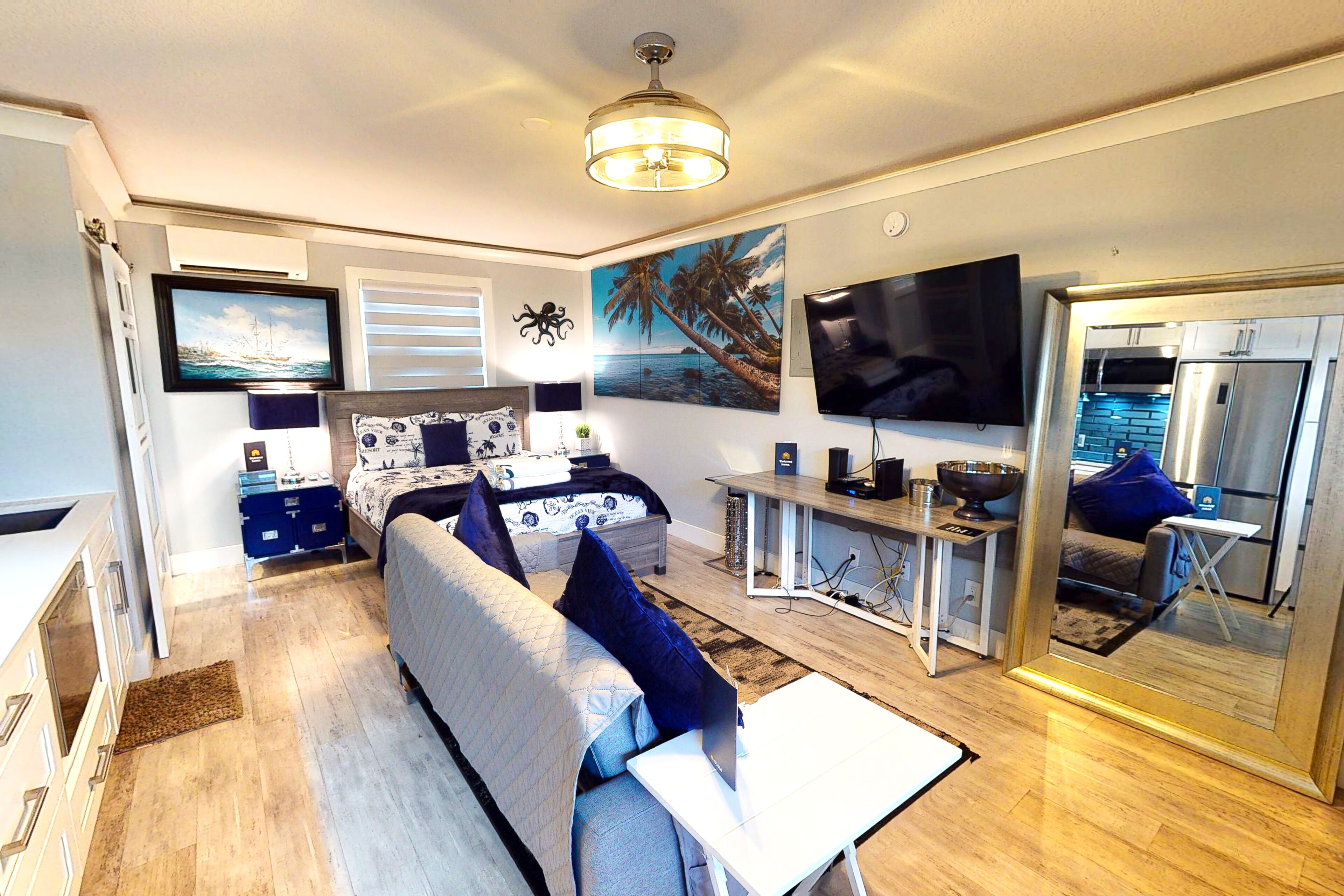 Sleek & modern waterfront studio condo with two pools, gym, beach access & lanai