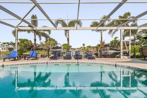 Outdoor pool, a heated pool - Stunning Remodel, HEATED POOL, Brand New Furnishings, Full Canal Sunset View (Cape Coral)