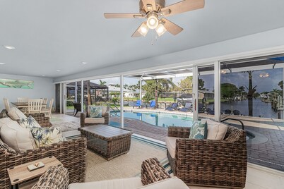 Stunning Remodel, HEATED POOL, Brand New Furnishings, Full Canal Sunset View