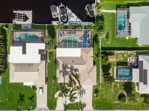 Exterior - Stunning Remodel, HEATED POOL, Brand New Furnishings, Full Canal Sunset View (Cape Coral)