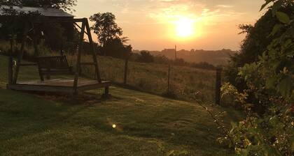 Hilltop Farmhouse with sunrise sunset porch overlooking hills and holler