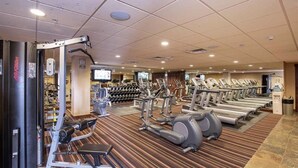 A gym with treadmills, elliptical machines, and weightlifting equipment. - ELKPOINT Ski-In/Out .. 4BR/4.5BA .. Sleeps 14 ..  Arcade-Shuffle Board-Foosball (Durango)