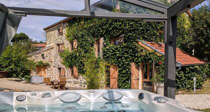 Gßte d'exception avec spa, jardin paysagé et équipements haut de gamme à Blanlhac