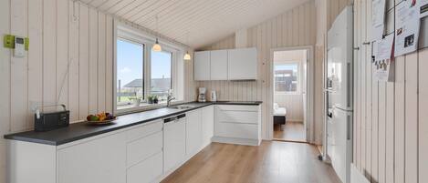 Fridge, oven, dishwasher, coffee/tea maker