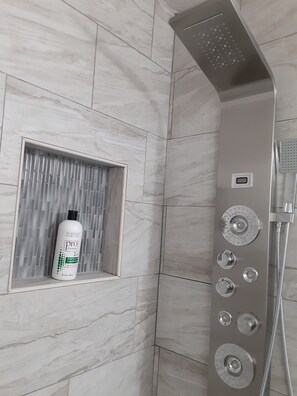 Shower, hair dryer, towels, soap