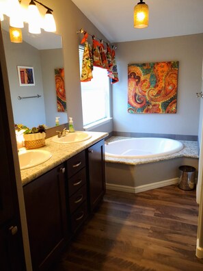Combined shower/tub, hair dryer, towels, soap
