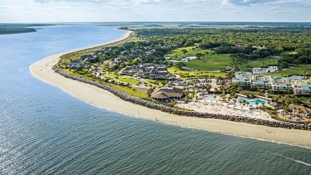 A coastal resort with beachfront properties, a golf course, and a swimming pool area. - PEACEFUL SEABROOK ISLAND TREEHOUSE WITH LAGOON VIEWS (Seabrook Island)