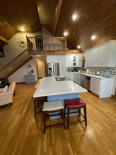 Lake house with boat ramp access across the street & tons of boat parking space.