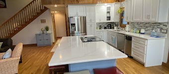 Lake house with boat ramp access across the street & tons of boat parking space.