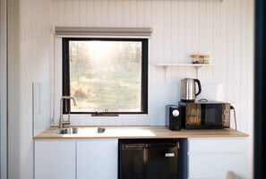 Fridge, microwave, stovetop, coffee/tea maker