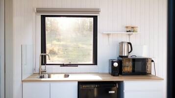 Fridge, microwave, stovetop, coffee/tea maker
