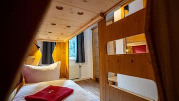 Blackout drapes, soundproofing, WiFi (free), bed sheets